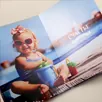 Яркая фотокнига с тdivердым переплетом